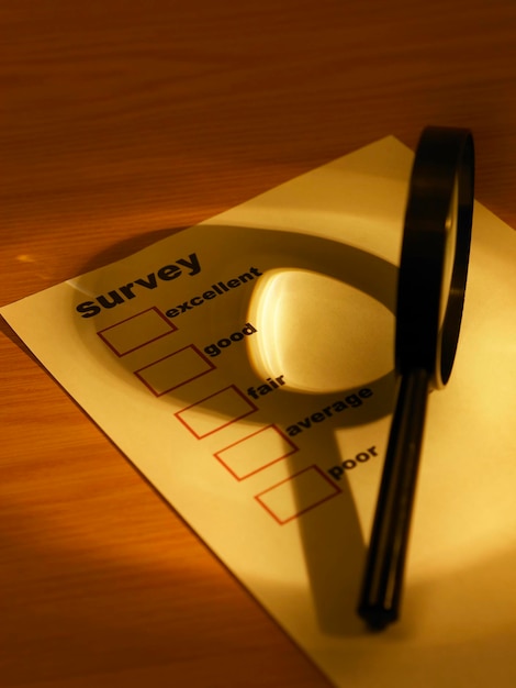 A close-up of a survey form being filled out, symbolizing the subjective nature of academic reputation as a ranking factor.