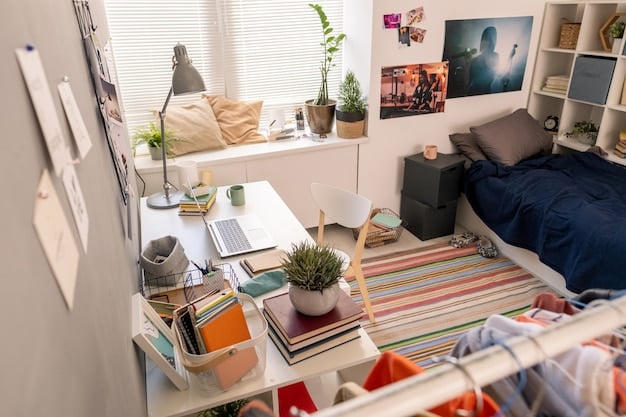 A cozy student dorm room with a neatly organized desk and books, suggesting a comfortable and cost-effective living arrangement.