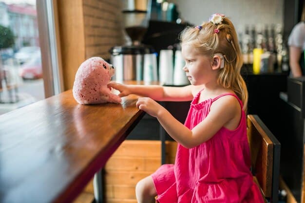 A young girl, around 8 years old, is sitting at a table with a piggy bank in front of her. She is carefully placing coins into the piggy bank with a focused and determined expression. The scene is set in a bright and cheerful children's room, with colorful toys and books in the background.