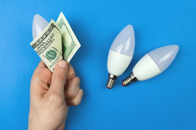 A person holding an energy-efficient LED light bulb, highlighting the concept of saving money on electricity bills.
