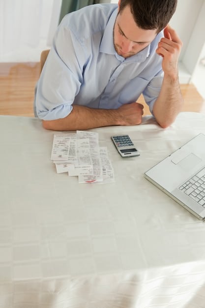 A person looking stressed while surrounded by tax forms and a calculator, symbolizing the overwhelm and potential for mistakes during tax season. The scene is chaotic but emphasizes the need for careful attention to detail.