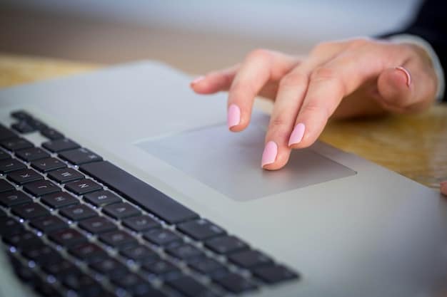 A close-up of hands typing on a laptop, with a form or application visible on the screen. The background is blurred, suggesting a focus on the application process.