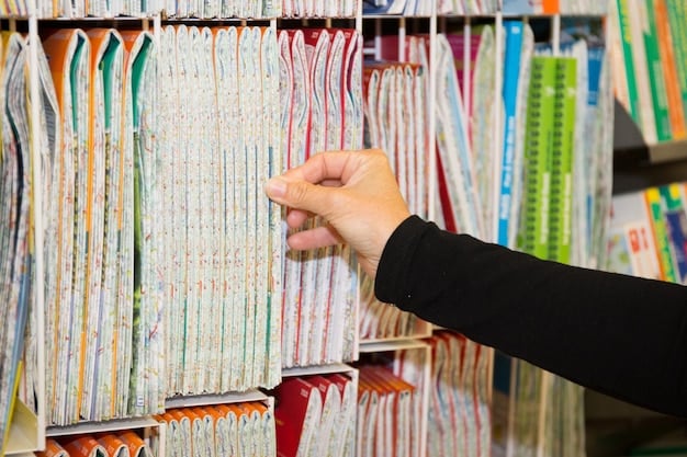 An organized binder filled with documents, labels, and clearly marked sections, representing a well-prepared appeal case. A hand is placing an additional document into the binder.