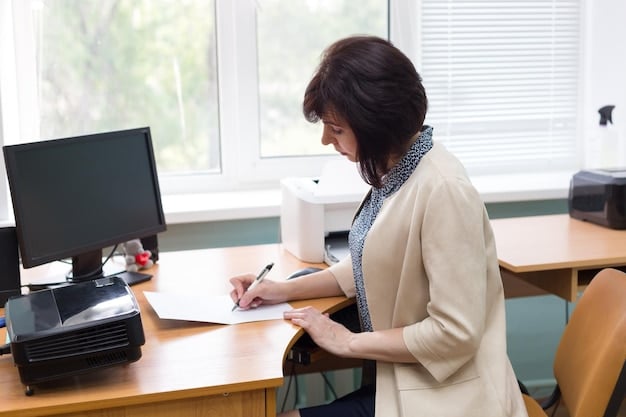 A school principal sitting at a desk in their office, reviewing a grant application with a team of teachers. The scene should convey collaboration, focus, and the importance of planning in the grant application process.