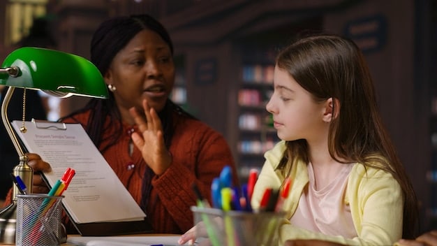 A special education teacher is working one-on-one with a student, illustrating the importance of adequate staffing and resources for individualized instruction.
