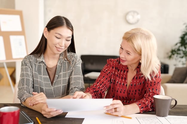 A parent filling out an application form at a table, with a friendly caseworker assisting and providing guidance.