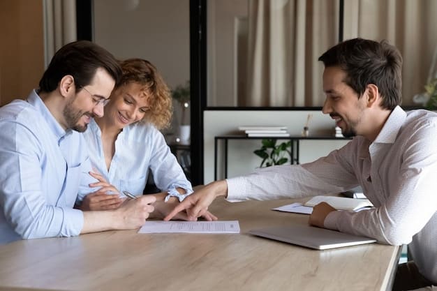 A financial advisor explaining mortgage options to a young couple at a desk with financial documents.