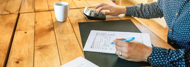 A person filling out an application form for a government assistance program, with various documents such as identification, proof of income, and residency certificates organized neatly on the table.