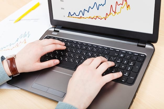 Hands typing on a laptop with a savings growth chart visible on the screen, emphasizing the concept of automatic savings and financial progress.
