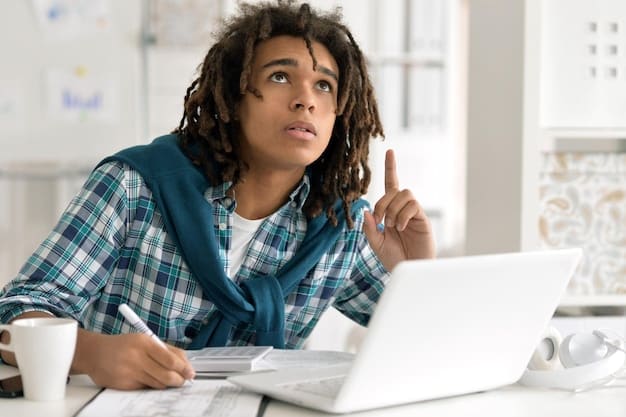 A close-up of a student completing the FAFSA form online, with a concerned expression. The image should highlight the complexity and importance of the FAFSA application process.